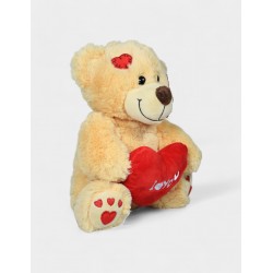 Peluche con corazón rojo